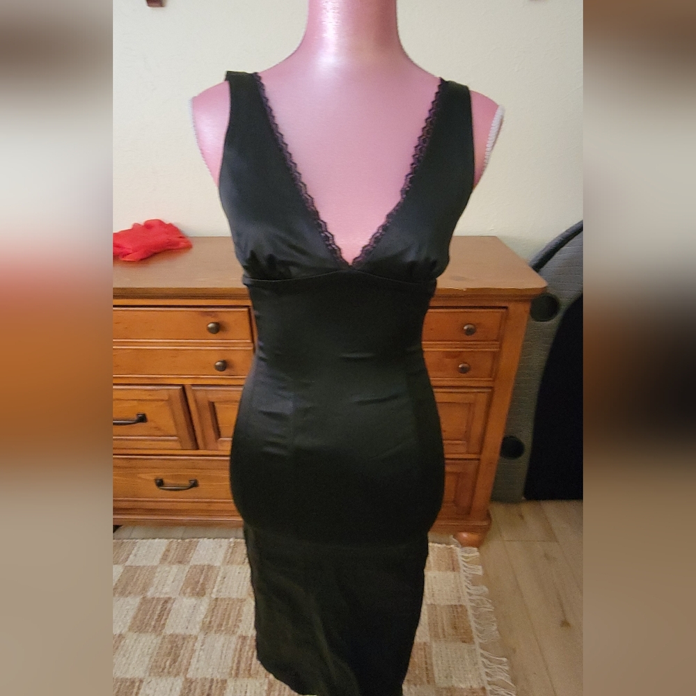 Two BEBE midi dresses